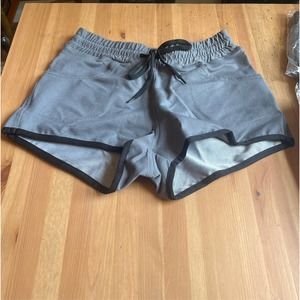 Gray shorts. 2 pockets drawstring elastic waist band.